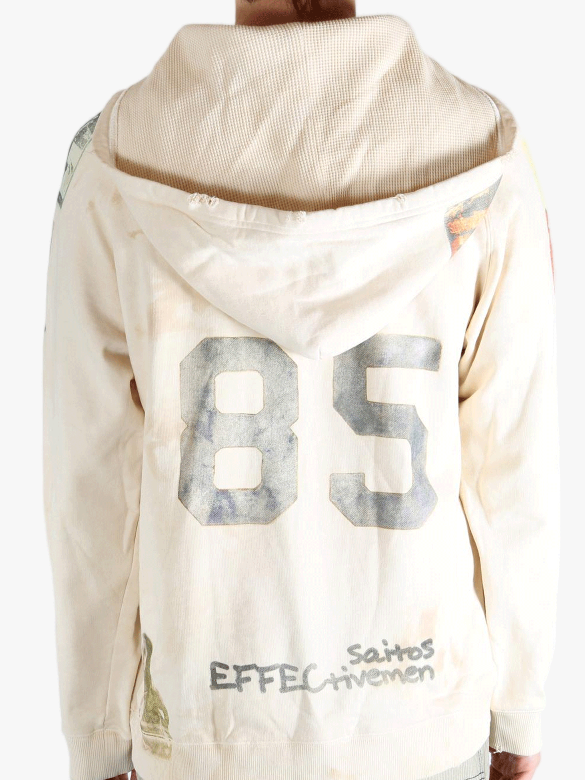 White sweats worn by a person, showing the sweats' fit