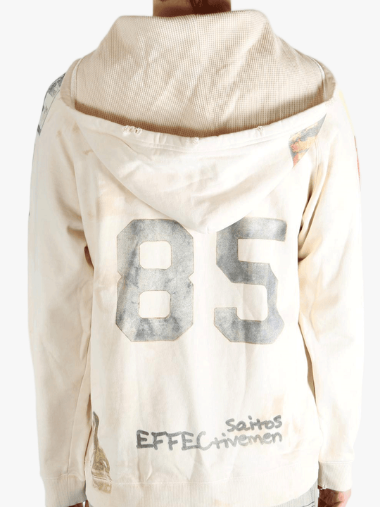 White sweats worn by a person, showing the sweats' fit