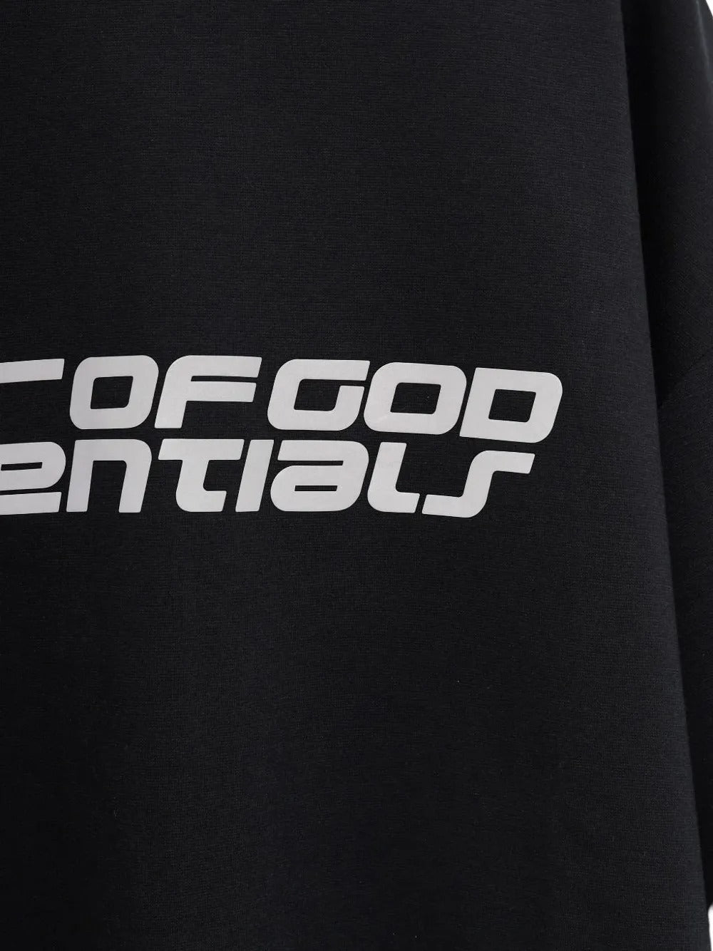 Close up of the black t-shirt, showing texture of the polyester and cotton fabric