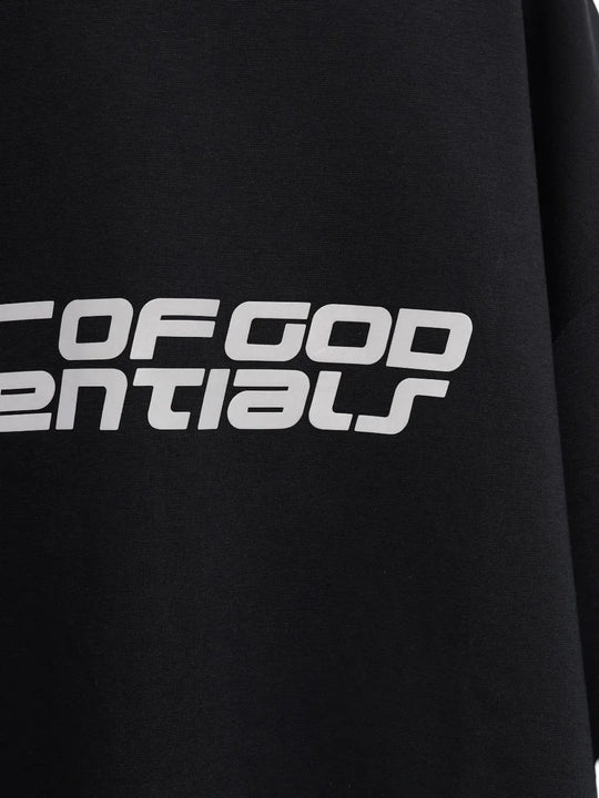 Close up of the black t-shirt, showing texture of the polyester and cotton fabric