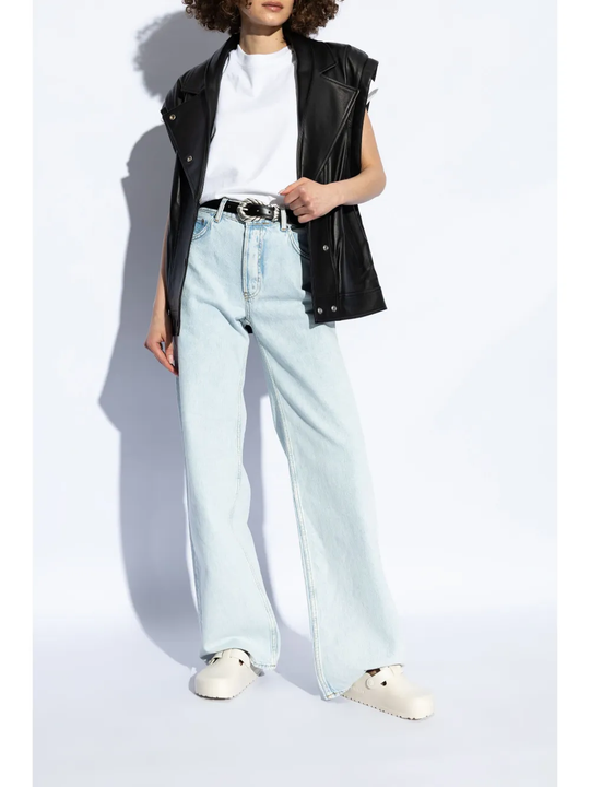 White sandals worn by a person, showing the sandals fit