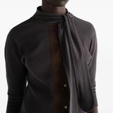 Grey t-shirt worn by a person, showing the t-shirt fit