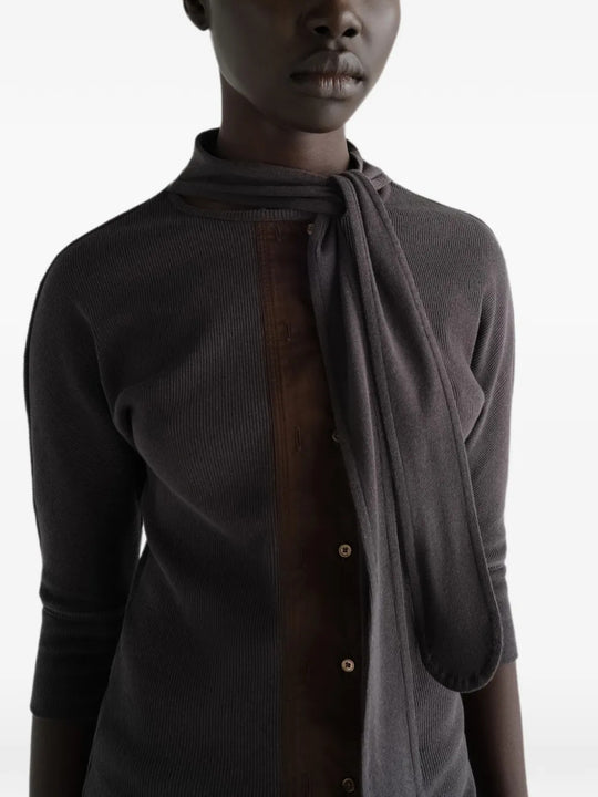 Grey t-shirt worn by a person, showing the t-shirt fit