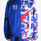 Blue jacket worn by a person,showing the jacket's fit