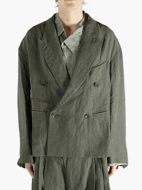 Green jackets worn by a person, showing the jackets fit