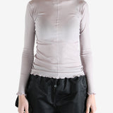 Purple t-shirt worn by a person, showing the shirt's fit