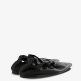 Black sneakers, back view