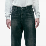 Blue pants worn by a person, showing the pants fit