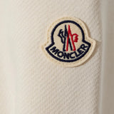 Close up of White knitwear, showing texture of the 100% polyamide fabric