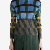 Blue top worn by a person, showing the top's fit