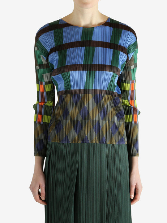 Blue top worn by a person, showing the top's fit