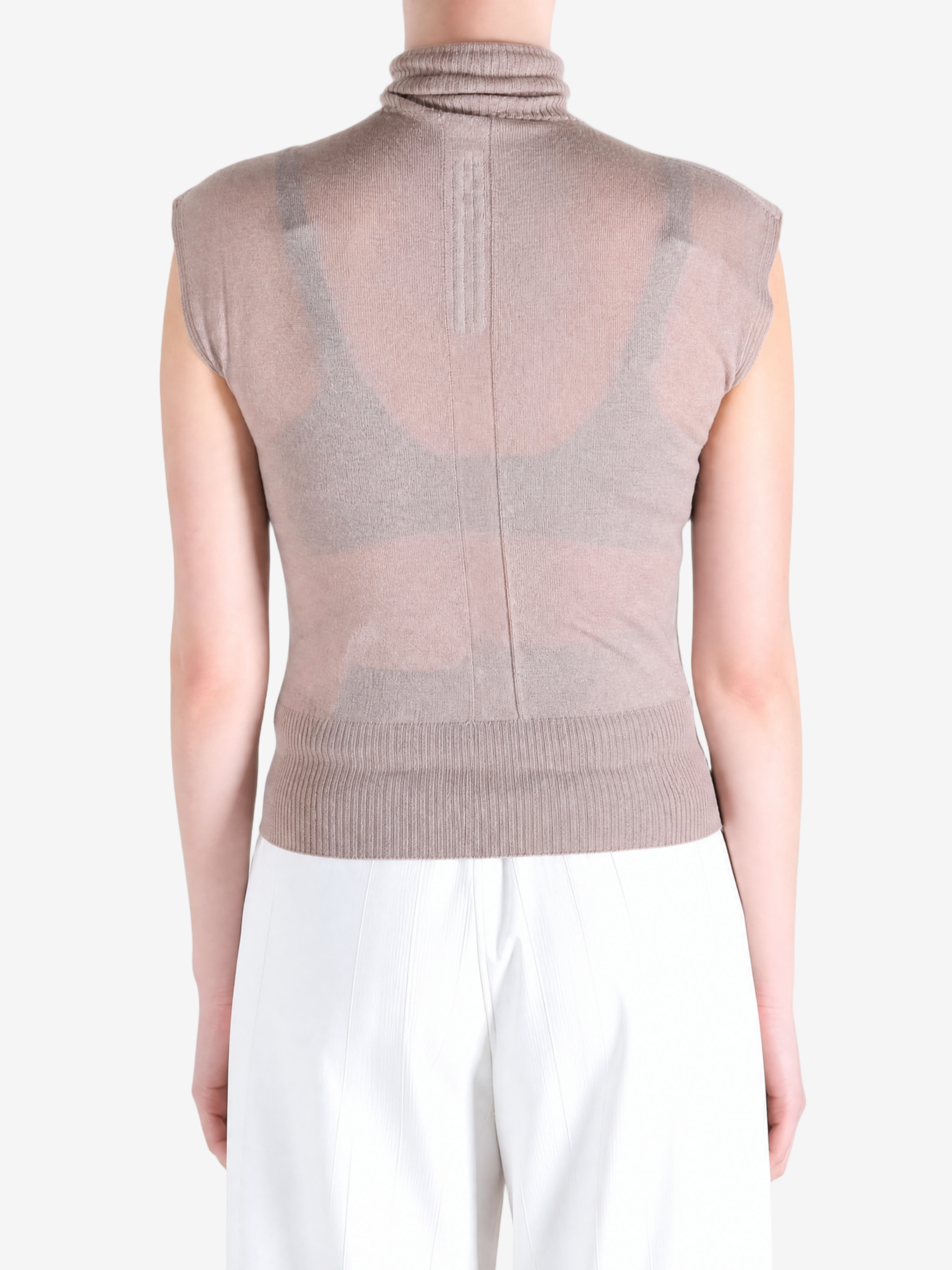 Brown top worn by a person, showing the top fit