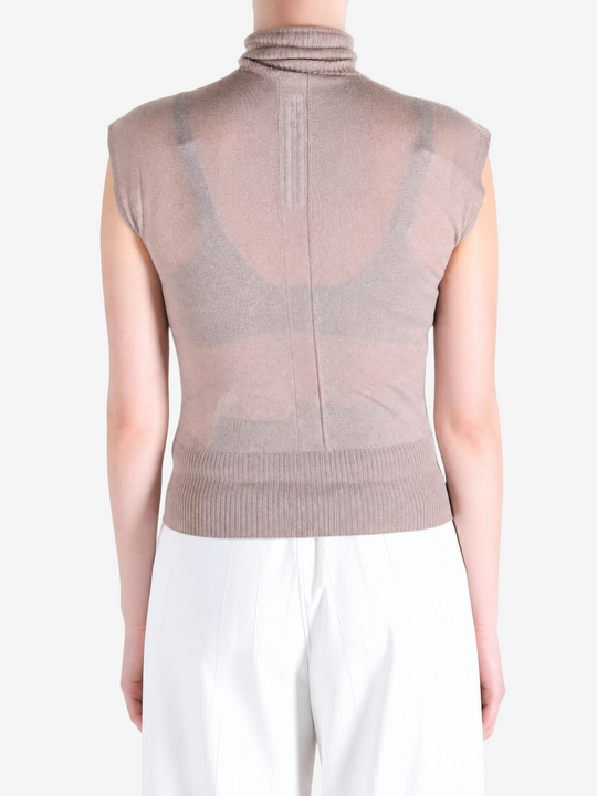 Brown top worn by a person, showing the top fit