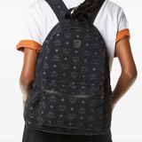 Black bag worn by a person, showing the bag's fit