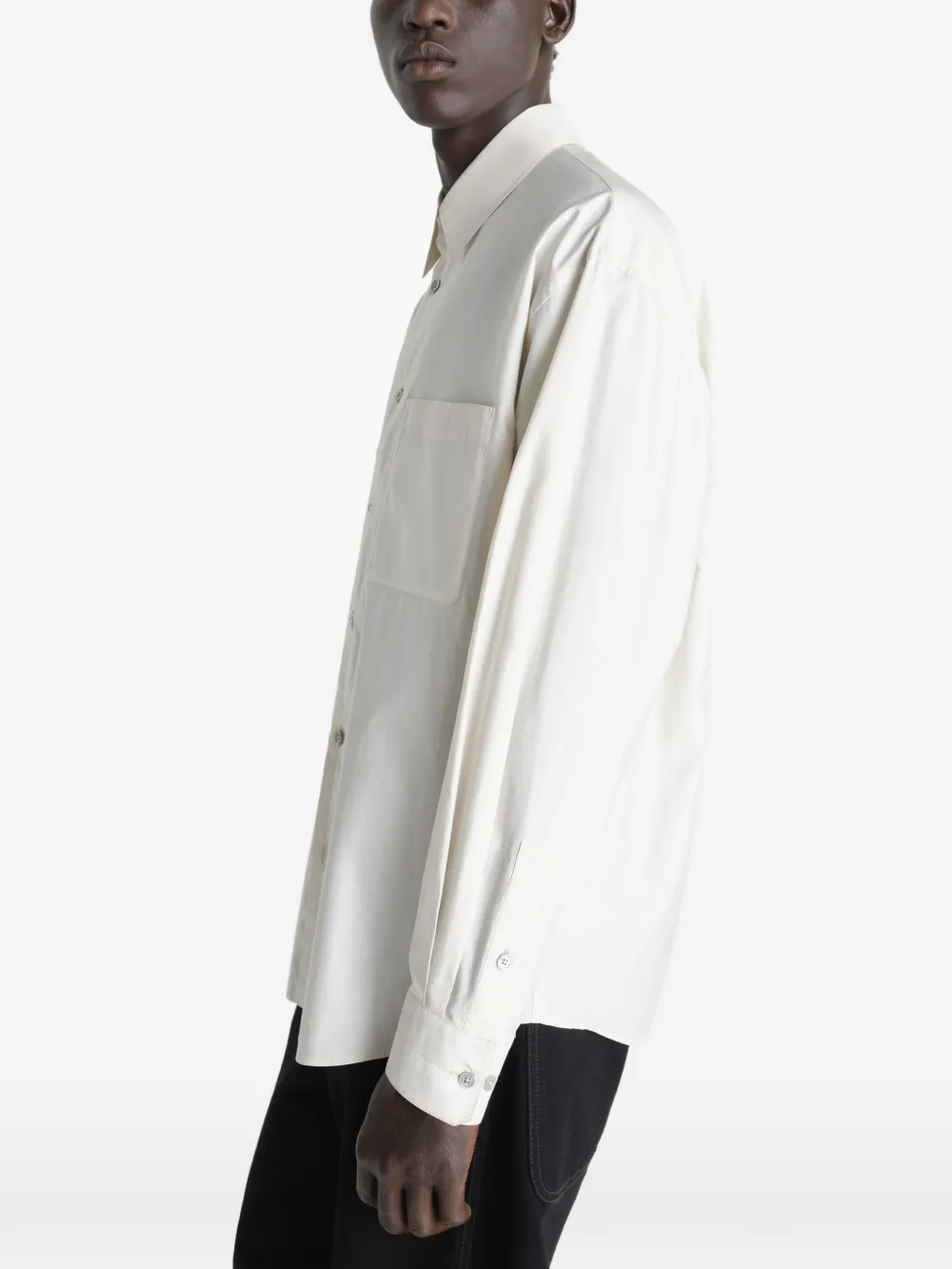 white shirts worn by a person, showing the shirts fit