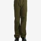Green pants worn by a person, showing the pants's fit