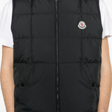 Black jackets-coats worn by a person, showing the jackets-coats's fit