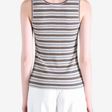 Tan top worn by a person, showing the top fit