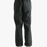 Grey pant worn by a person, showing the pant's fit