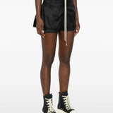 Black shorts worn by a person, showing the shorts' fit