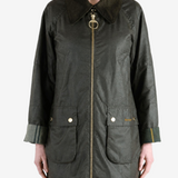 Green jacket worn by a person, showing the jacket fit