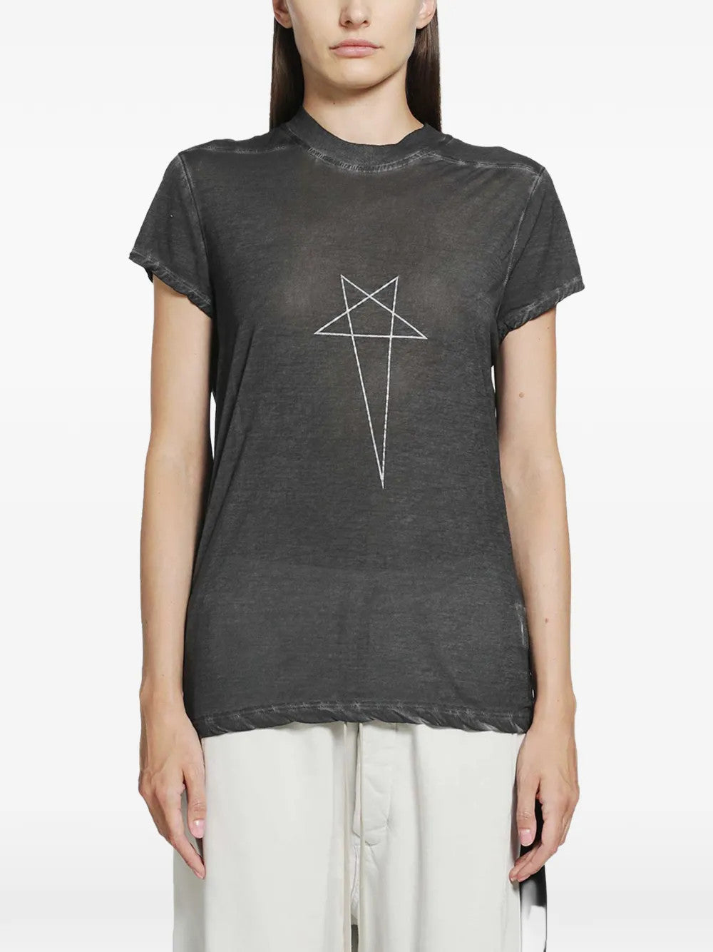 Black t-shirt worn by a person, showing the t-shirt fit