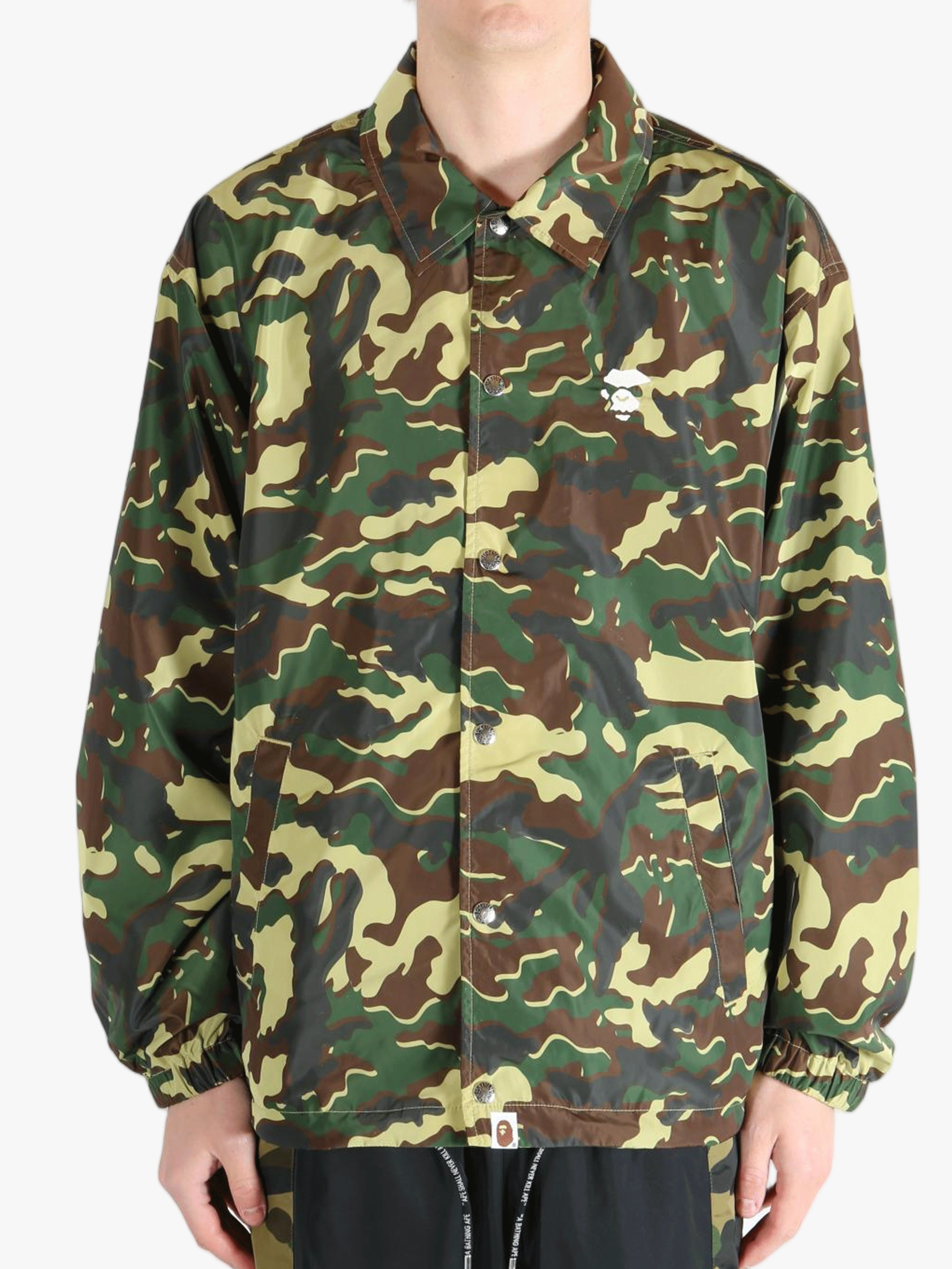 Green jacket worn by a person,showing the jacket's fit