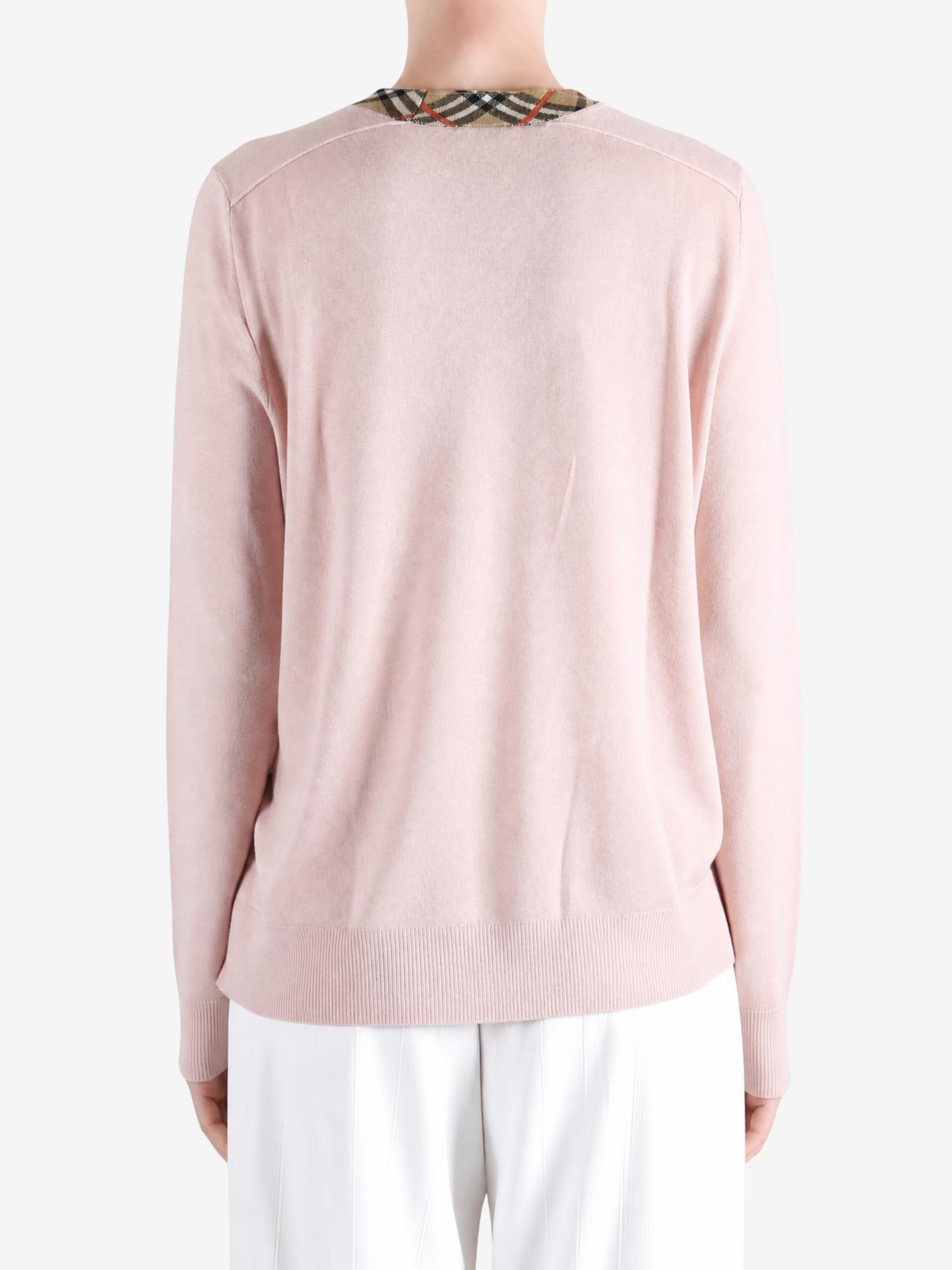 Pink knitwear, front view