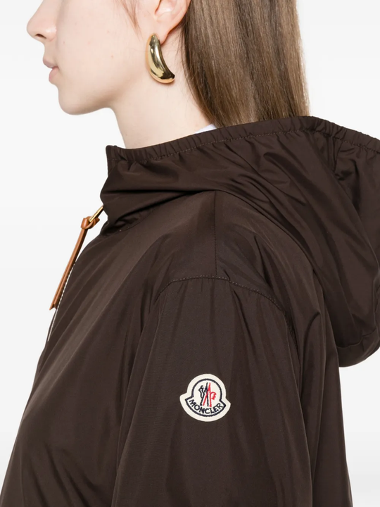 Close up of brown jacket, showing texture of the Polyester fabric