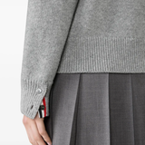 Close up of grey knitwear, showing texture of the Wool fabric