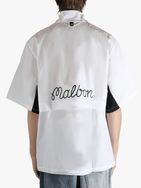 white t-shirts worn by a person, showing the t-shirts fit