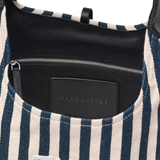 close up of blue bags, showing texture of the cotton fabric