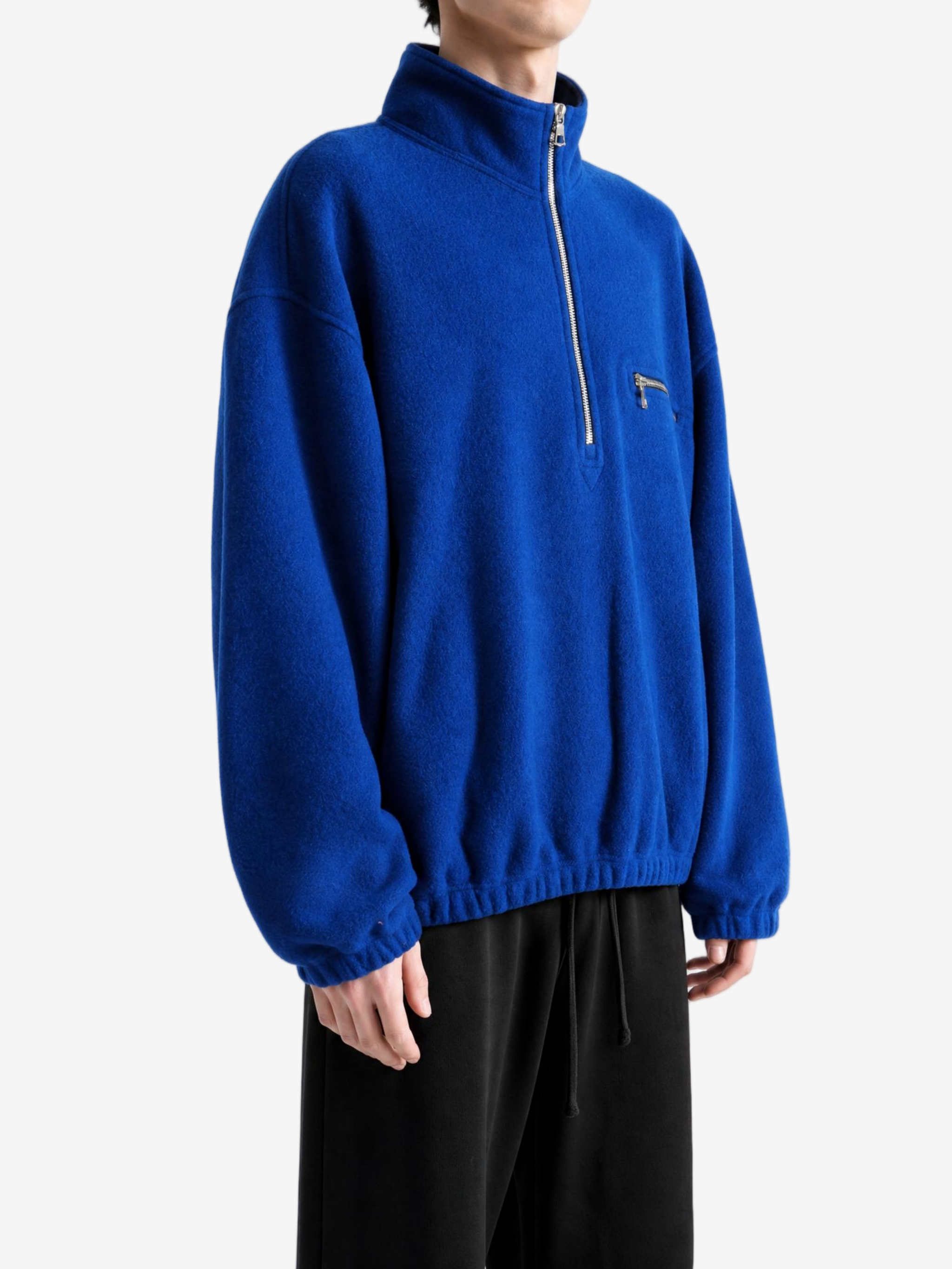 Blue top worn by a person, showing the top fit