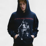 Green hoodie worn by a person, showing the hoodie's fit