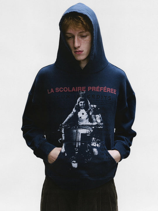 Green hoodie worn by a person, showing the hoodie's fit