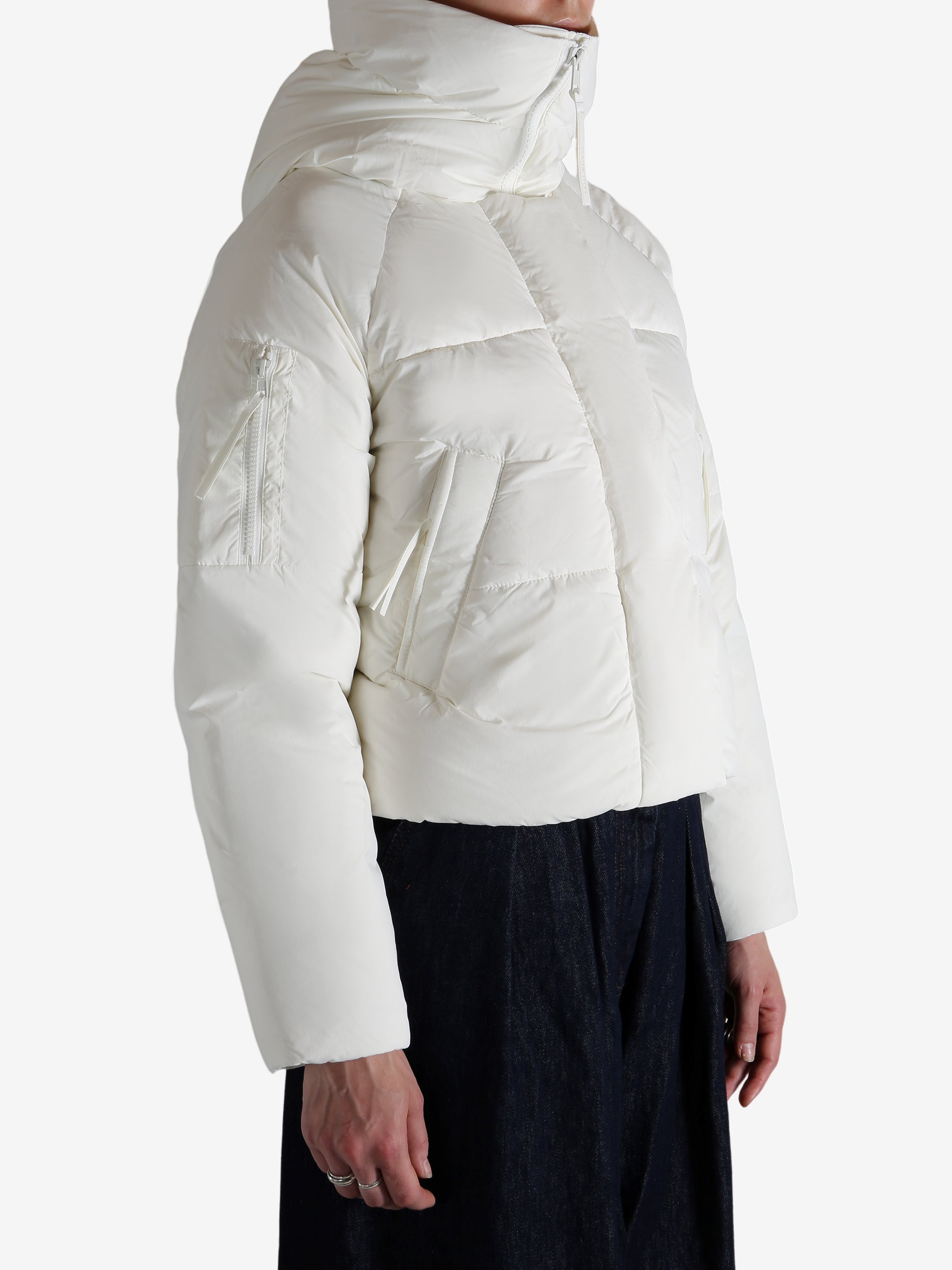 white down jacket，worn by a person, showing the down jacket fit