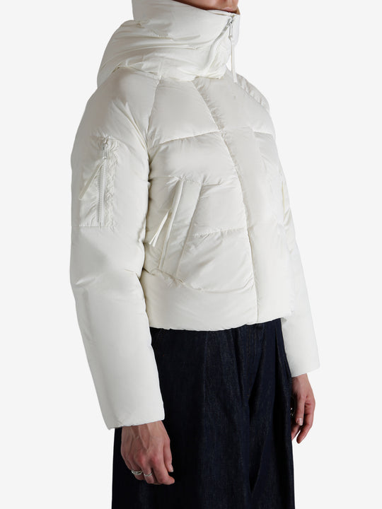 white down jacket，worn by a person, showing the down jacket fit