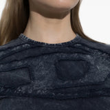 Navy top worn by a person, showing the top fit