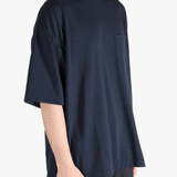 Navy t-shirt worn by a person, showing the t-shirt's fit