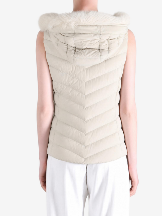 Tan jacket worn by a person, showing the jacket fit