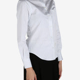 Blue shirt worn by a person, showing the shirt's fit