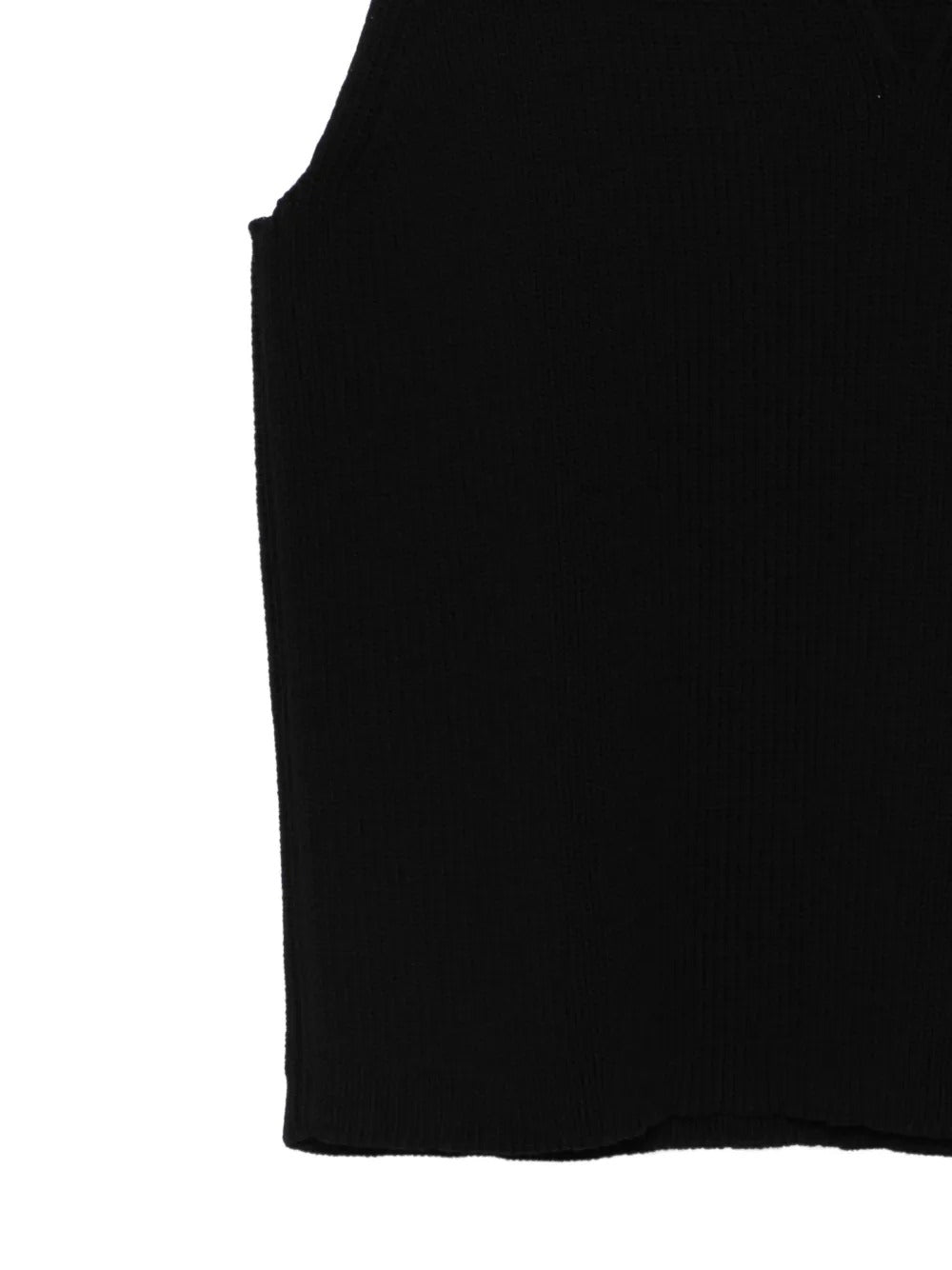 Close up of black T-shirt, showing texture of the wool fabric