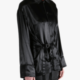 Black top worn by a person, showing the top's fit