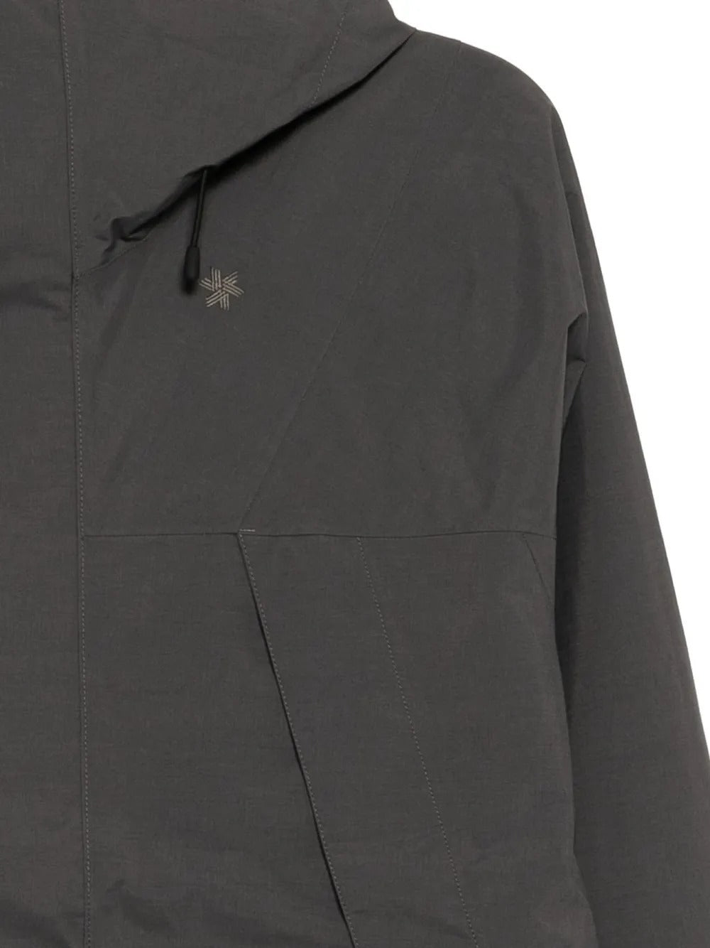Close up of black jackets, showing texture of the nylon fabric