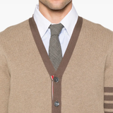 Close up of the brown knitwear, showing texture of the cotton fabric