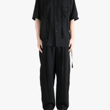 Black shirt, full body view