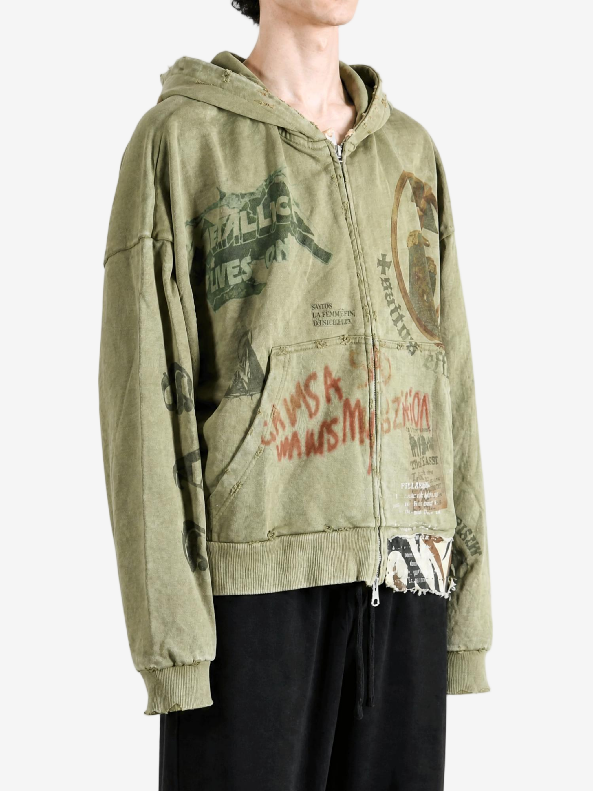 Green hoodie worn by a person, showing the hoodie fit