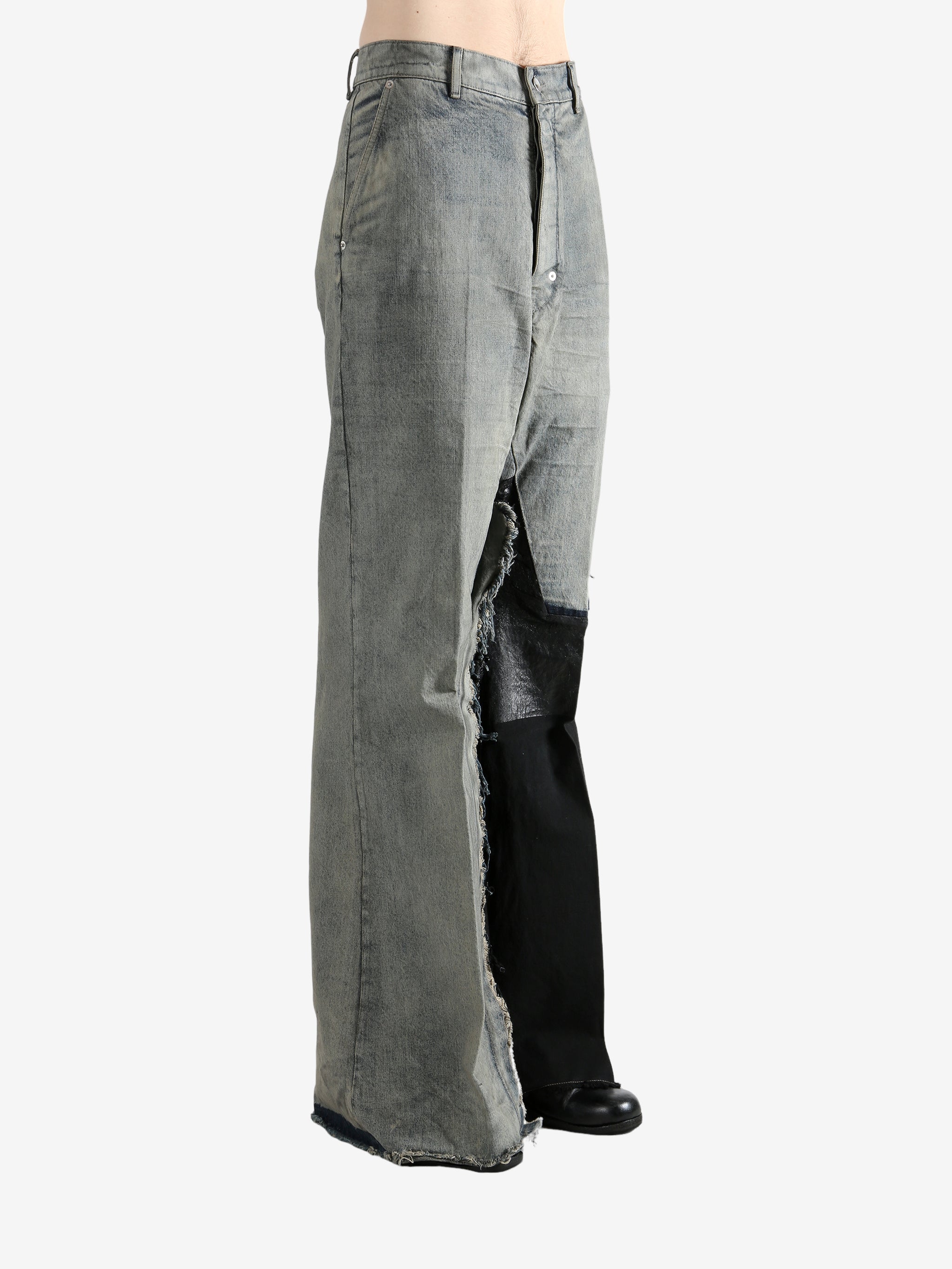 Grey jeans worn by a person, showing the jeans's fit