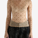 Tan top worn by a person, showing the top fit