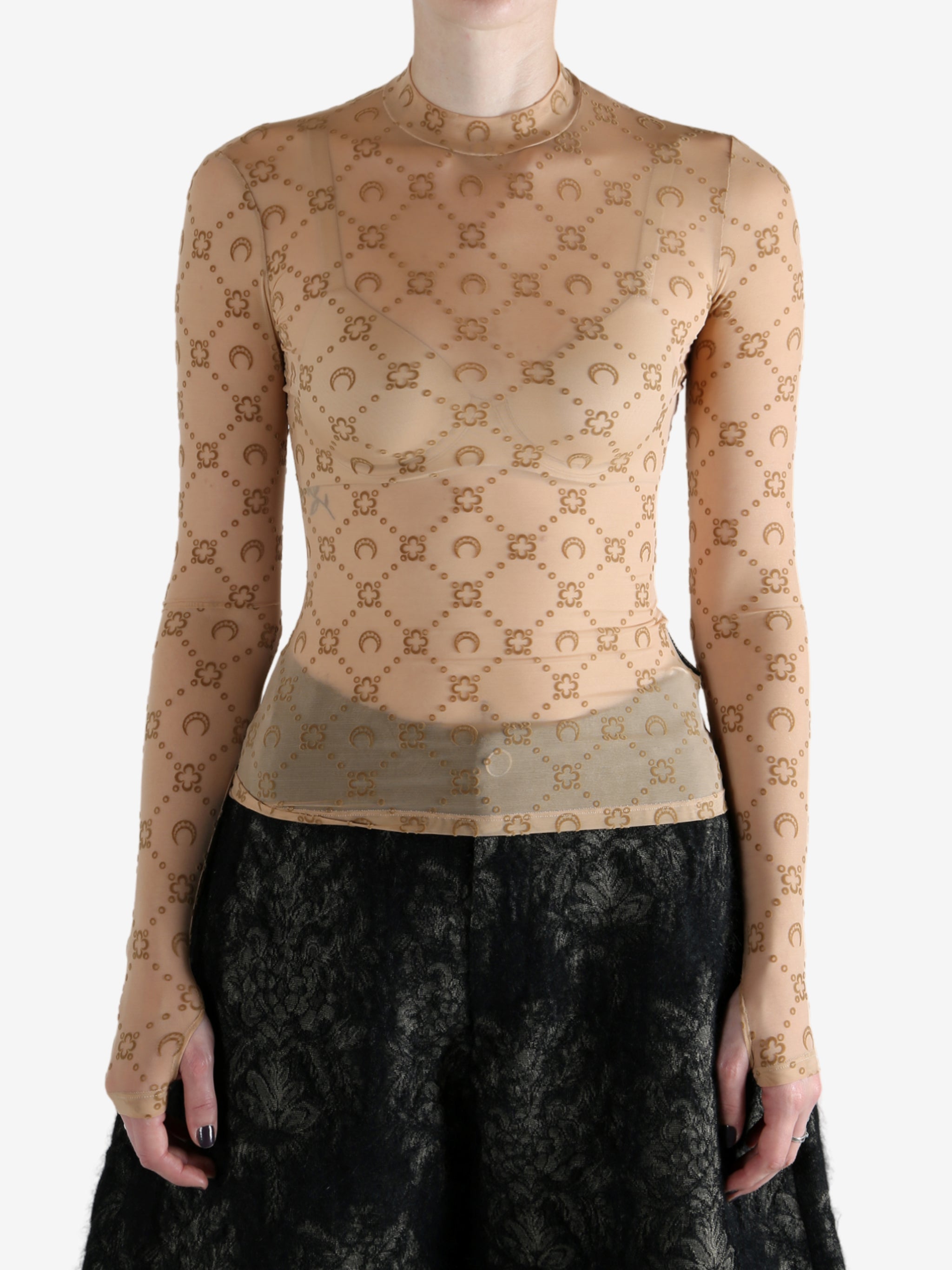 Tan top worn by a person, showing the top fit